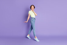 Full Length Body Size Profile Side View Of Lovely Amazed Girl Jumping Going Pout Lips Isolated Over Violet Color Background