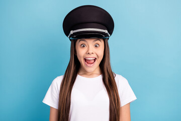 Sticker - Photo of young happy excited crazy screaming little girl in pilot cap see huge sale isolated on blue color background