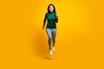 Poster - Full length photo of charming active woman jump up run good mood sale isolated on shine yellow color background