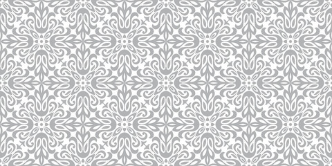 floral pattern. vintage wallpaper in the baroque style. seamless vector background. white and gray o