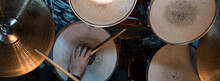 Professional Drum Set Closeup Panorama Banner. Man Drummer With Drumsticks Playing Drums And Cymbals, On The Live Music Rock Concert Or In Recording Studio   