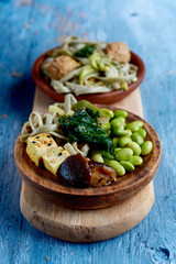 Canvas Print - two different vegan dishes on a table