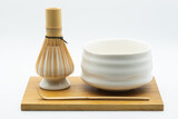 Fototapeta Góry - Matcha maker set including with bamboo spoon, ceramic bowl and matcha bamboo whisk isolated on white background