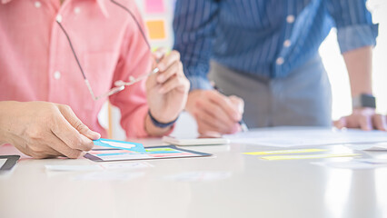 Creative Web Designer planning application and developing template layout, framework for mobile phone. User experience (UX) concept.
