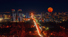 Night City With Red Full Moon