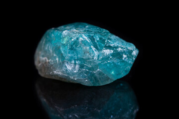 Macro mineral stone apatite on black background