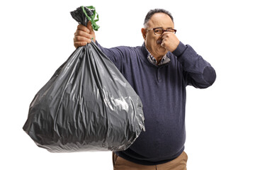 Poster - mature man holding a smelly waste bag