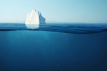 Wall Mural - iceberg floats in the ocean with an underwater view. glacier melting and global warming concept