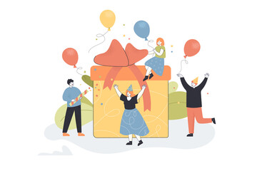 Wall Mural - Tiny people surprising girl with gift. Birthday celebration or party, friends in hats flat vector illustration. Birthday, Christmas, party concept for banner, website design or landing web page