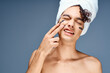 © SHOTPRIME STUDIO - man with bare shoulders black cream face mask clear skin