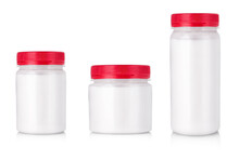 White Jars With Red Cap Without Label On A White Background