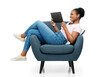 © Syda Productions - people and technology concept - happy smiling young african american woman with tablet pc computer sitting in modern armchair over grey background
