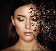 Woman face disintegrates. Skincare concept.