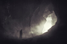 Mysterious Silhouette In Dark Cave, Fantasy Landscape