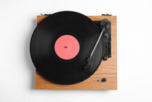 Modern Vinyl Record Player With Disc On White Background, Top View