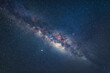 Close up of the milky way with bright stars on blue sky at night. Natural universe space landscape background. It is the galaxy that contains our Solar System
