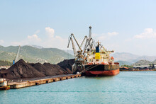 Coal Unloaded By Industrial Cranes From The Freight Vessel, International Port Of Ploce, Croatia