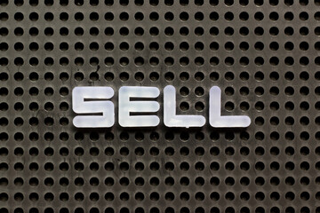 Sticker - White color letter in word sell on black pegboard background