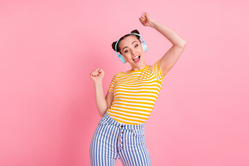 Sticker - Photo of hooray nice brunette lady dance wear headphones t-shirt pants isolated on pink background