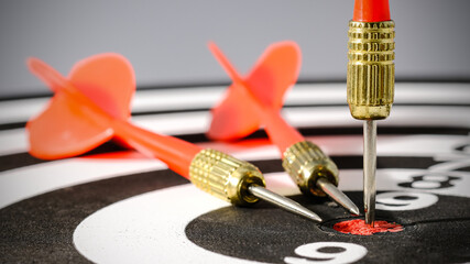 Wall Mural - Goals concept - Smart goal setting, red three darts arrows in the target center business goal concept, for business targeting and winning concepts. financial growth success process.