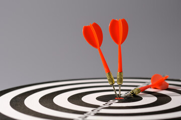 Wall Mural - Goals concept - Smart goal setting, red three darts arrows in the target center business goal concept, for business targeting and winning concepts. financial growth success process.