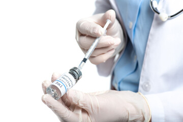 Wall Mural - Cropped view of doctor in latex gloves holding jar with vaccine and syringe isolated on white