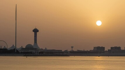 Wall Mural - Sunset in Abu Dhabi over Marina Island timelapse