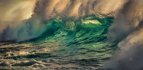 Wall Mural - storm in the ocean with big waves and emerald sunset color on background