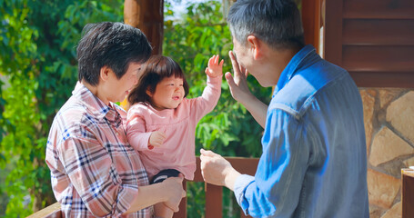 Wall Mural - grandparents have fun with girl