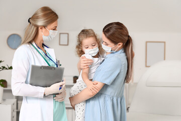 Sticker - Woman with her little daughter visiting pediatrician in clinic