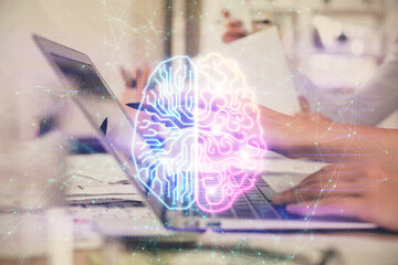 Multi exposure of woman hands working on computer and brain hologram drawing. Ai concept.