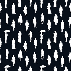 Wall Mural - Black and white monochrome seamless pattern with silhouettes of many walking and standing people in warm clothes. On black background.