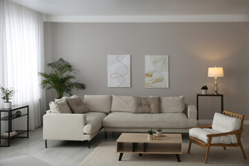 Big comfortable sofa in living room. Interior design