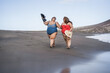 © DisobeyArt - Plus size women walking on the beach having fun during summer vacation - Focus on faces