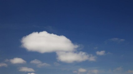 Wall Mural - the texture of the blue sky with the change of cumulus clouds to cirrus. change in weather. natural 