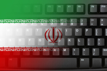 The internet in the Iran with the flag on a black keyboard