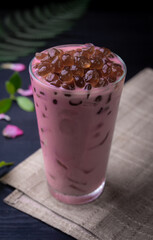 Sticker - Rose milk tea with bubble (tapioca ball)on wood background