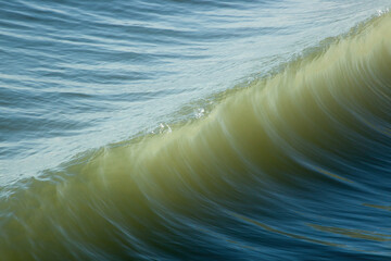 Ocean waves in the morning sun