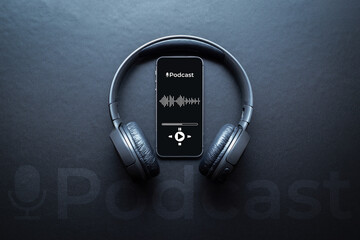 Podcast music. Mobile smartphone screen with podcast application, sound headphones. Audio voice with radio microphone on black background. Broadcast media music banner with copy space.