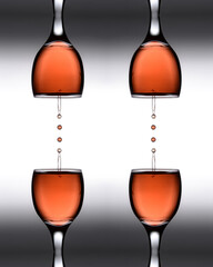 Wall Mural - Kaleidoscopic pattern of a wine glass and cherry juice drop splash 