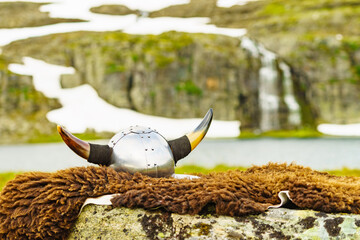 Wall Mural - Viking helmet on lake shore, Norway