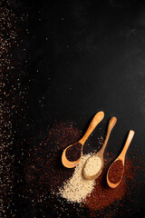 Wall Mural - Set with different types of quinoa on dark background. Organic food concept.