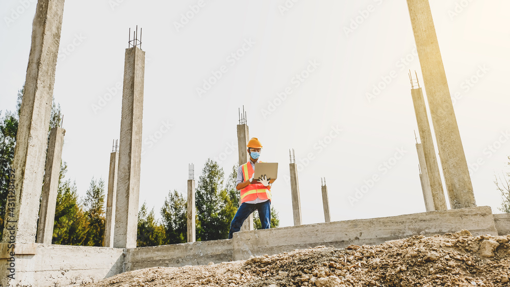 Engineer contractor man use lptop work safety industry project, check ...