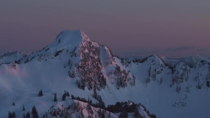 Wall Mural - 4k aerial dramatic mountains winter sunset