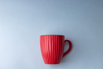 Poster - Top view of a cup of hot coffee isolated on a gray background