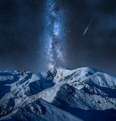 Wall Mural - Milky way over mountain Kasprowy Wierch in winter.