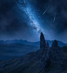 Wall Mural - milky way over old man of storr, scotland at night