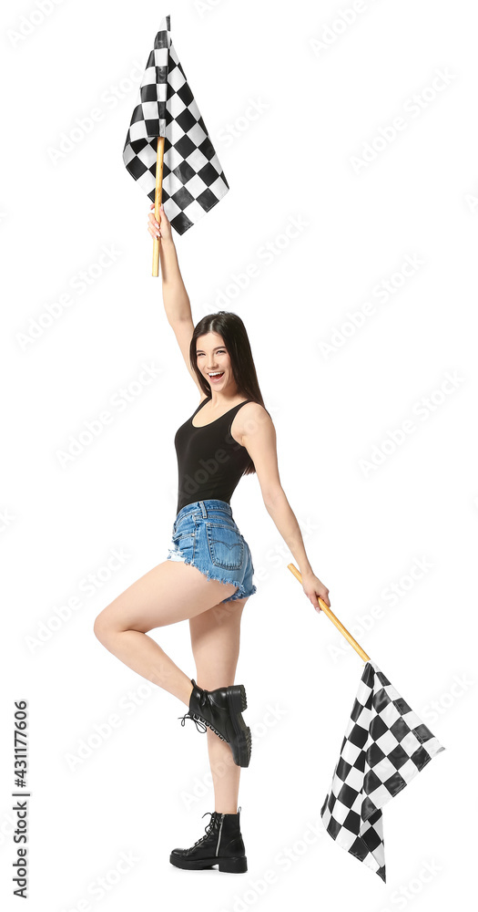 Beautiful young woman with racing flags on white background