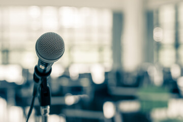 microphone voice speaker in business seminar, speech presentation, town hall meeting, lecture hall o