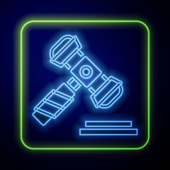 Canvas Print - Glowing neon Judge gavel icon isolated on blue background. Gavel for adjudication of sentences and bills, court, justice. Auction hammer. Vector